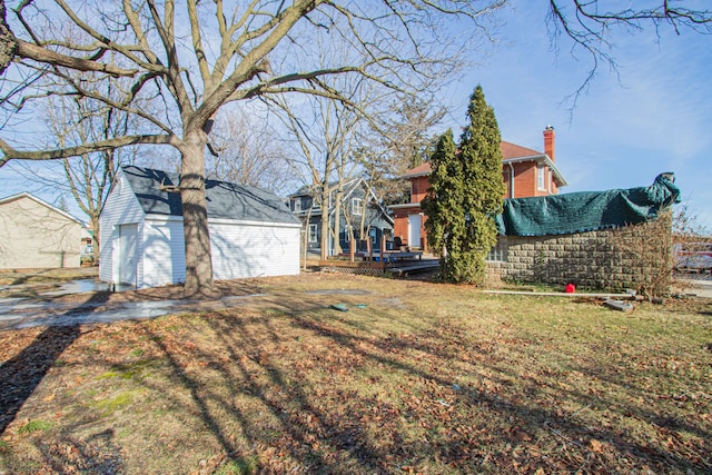 view of yard with a garage