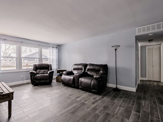 living room with dark wood-type flooring