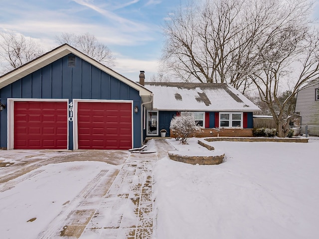 ranch-style home with a garage