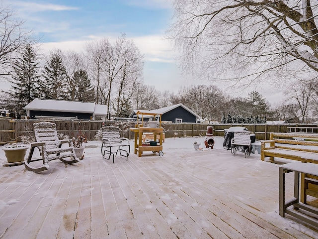 view of snow covered deck