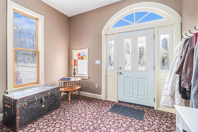 entryway featuring carpet floors