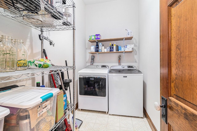 laundry room with independent washer and dryer