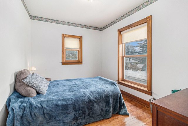 bedroom featuring hardwood / wood-style floors