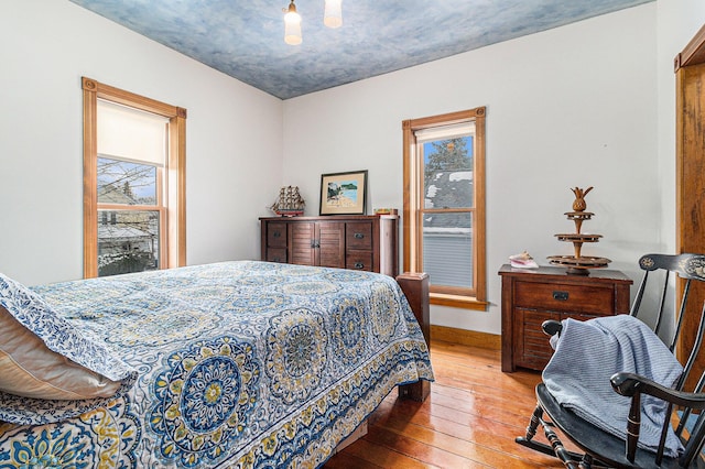 bedroom with light hardwood / wood-style flooring