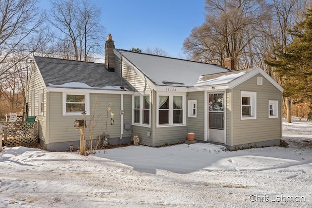 view of snow covered property