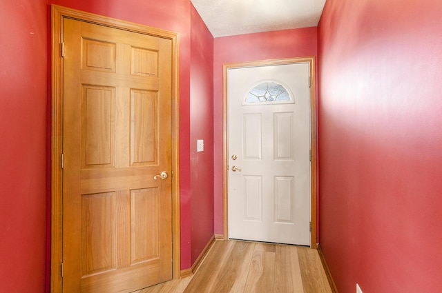 doorway featuring light hardwood / wood-style flooring