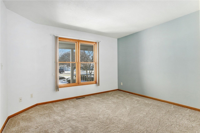 view of carpeted spare room