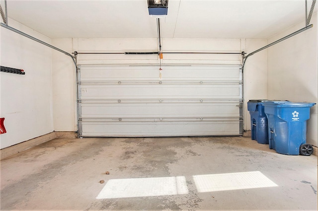 garage featuring a garage door opener