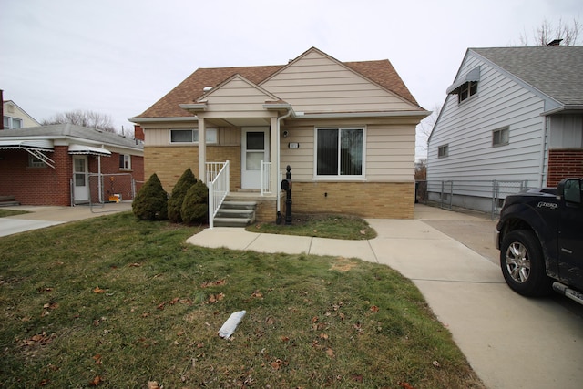 bungalow with a front lawn