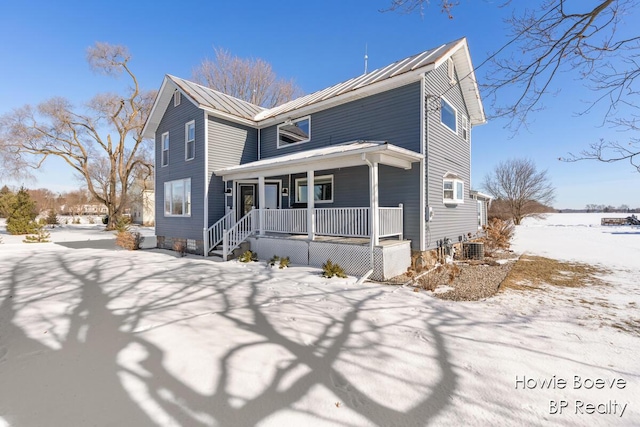 view of property featuring a porch