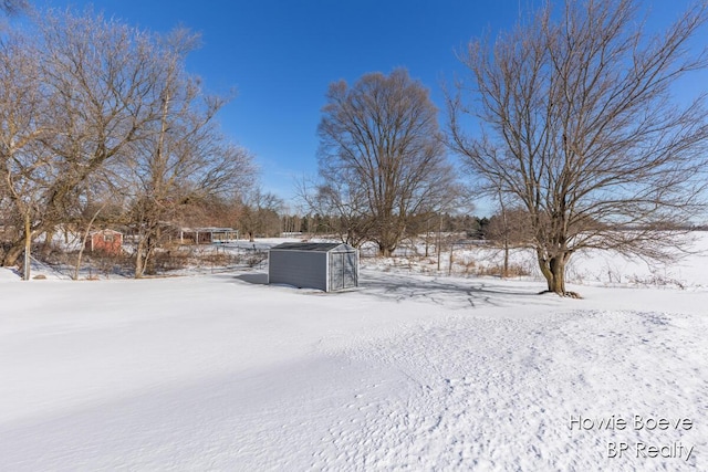 view of snowy yard