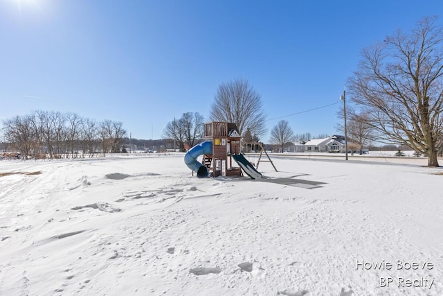 view of snow covered playground