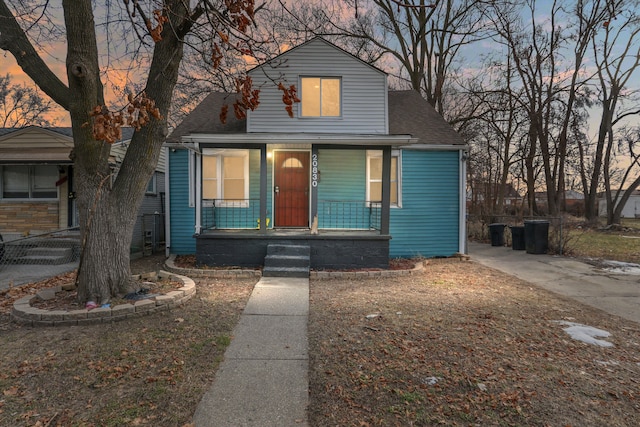 bungalow-style home with covered porch