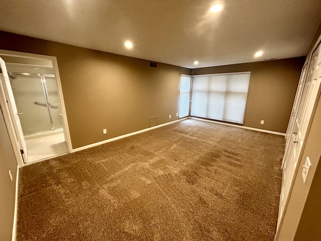 unfurnished bedroom with carpet floors