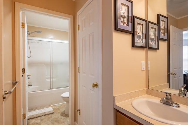 full bathroom with toilet, combined bath / shower with glass door, crown molding, vanity, and tile patterned flooring