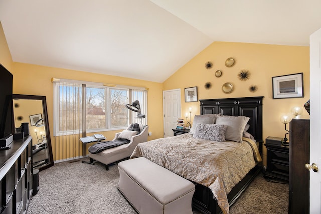 bedroom featuring carpet and lofted ceiling