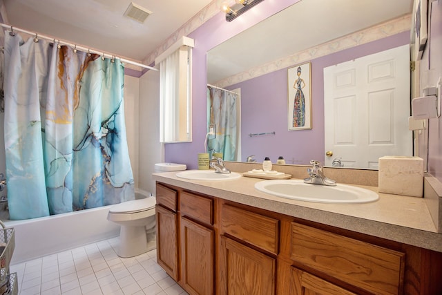 full bathroom featuring shower / tub combo with curtain, tile patterned floors, toilet, and vanity