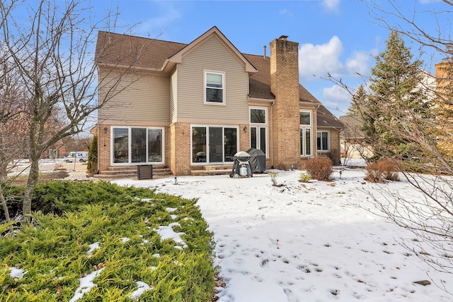 view of snow covered property