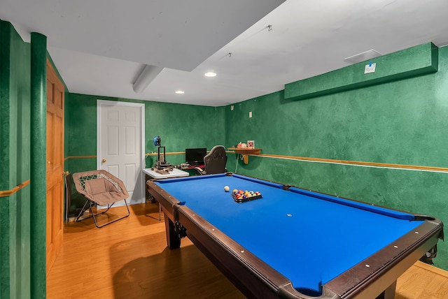 game room with pool table and hardwood / wood-style floors