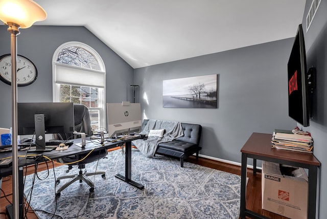 office space featuring lofted ceiling and wood-type flooring