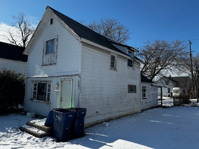 view of snow covered property