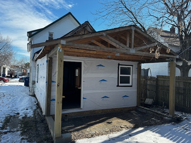 view of outdoor structure with fence