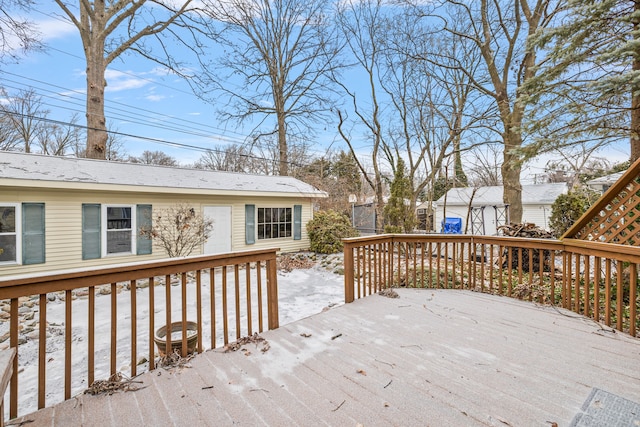 view of snow covered deck