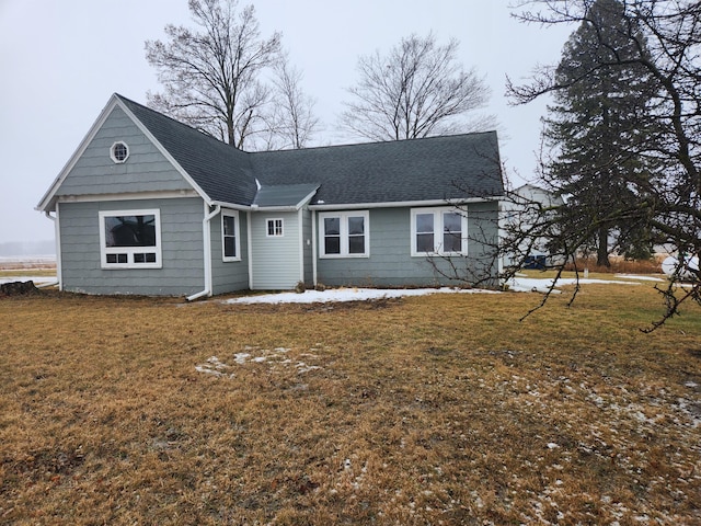 ranch-style house with a front yard