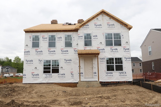 14390 Old Oak Trl, Van Buren, MI 48111 - unfinished property featuring a chimney