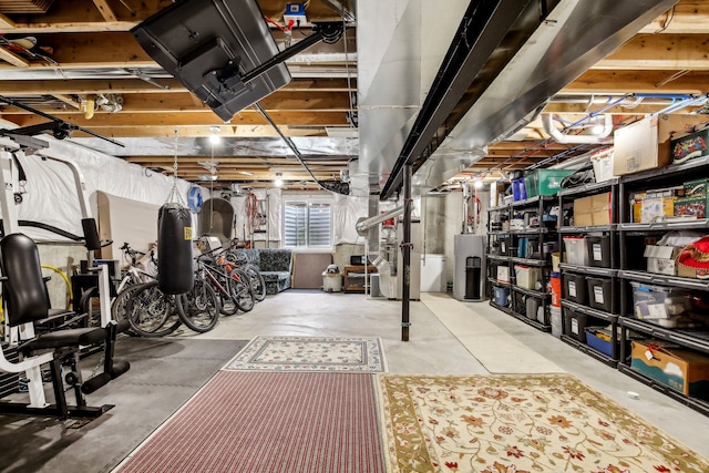 basement with water heater and heating unit