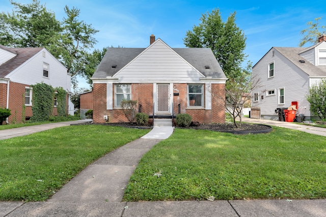 view of front of property featuring a front yard