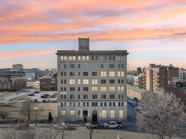 view of outdoor building at dusk