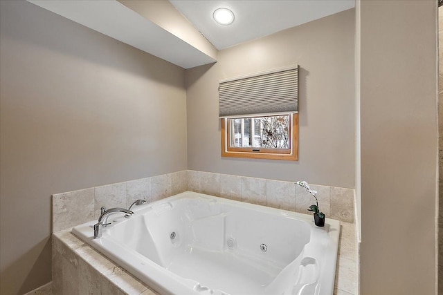 bathroom featuring tiled bath