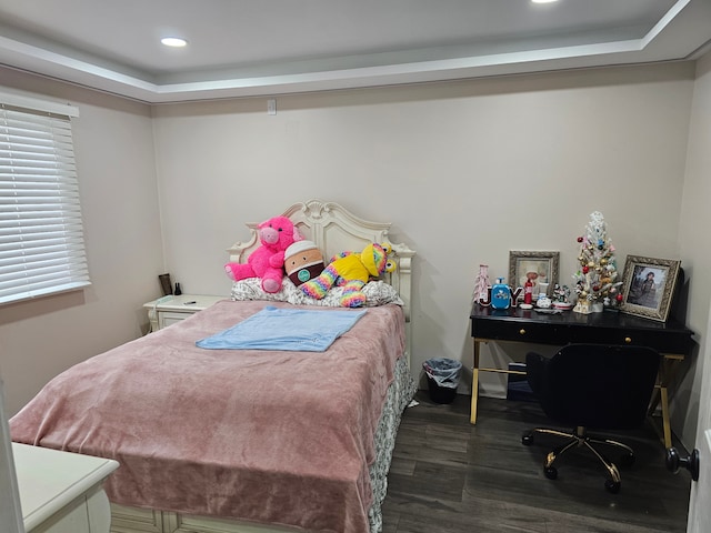 bedroom featuring dark hardwood / wood-style floors