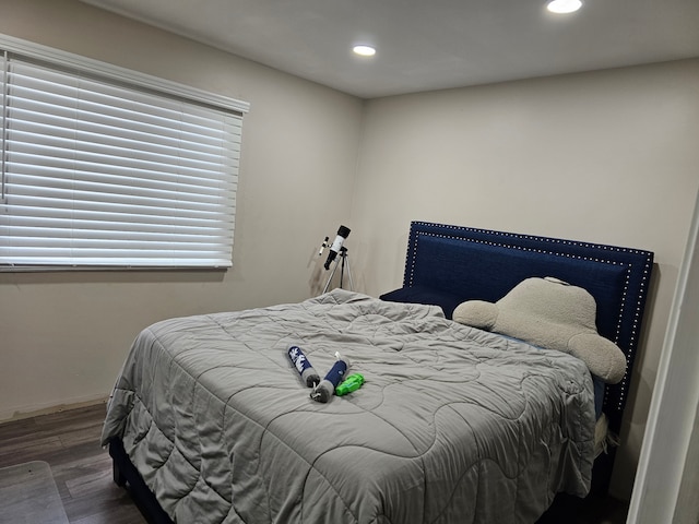 bedroom featuring wood-type flooring