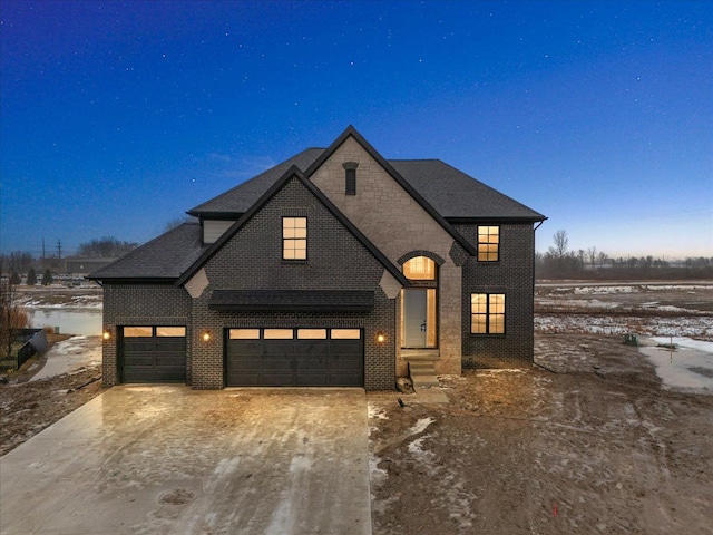 view of front of property with a garage