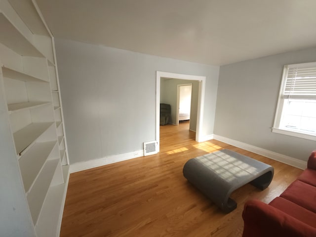 living room with light hardwood / wood-style floors