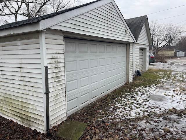 view of snow covered garage