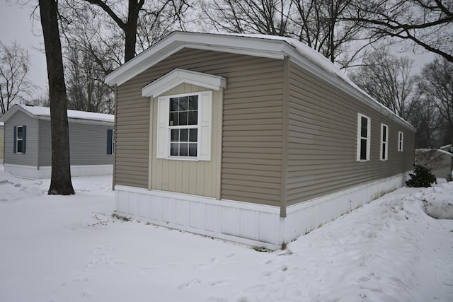 view of snow covered property