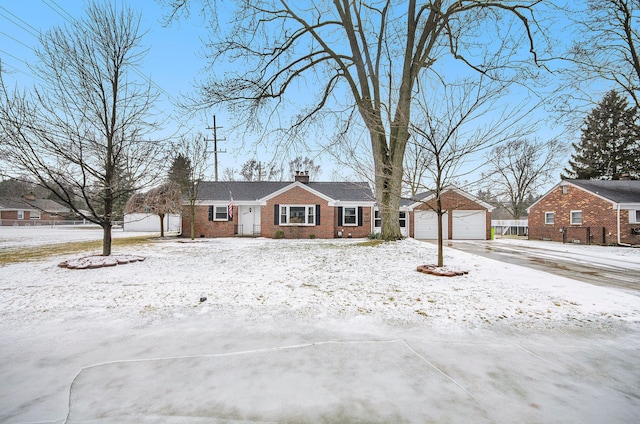 single story home featuring a garage