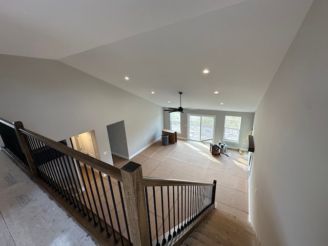 staircase with vaulted ceiling