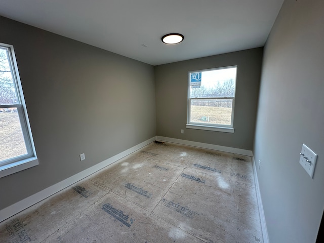 empty room featuring plenty of natural light