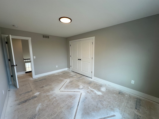 unfurnished bedroom featuring a closet