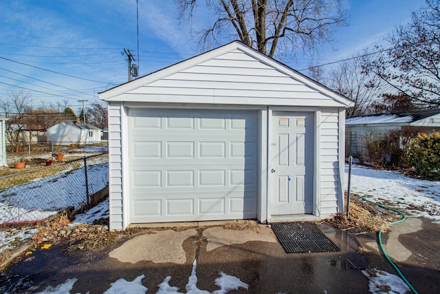 view of snow covered garage