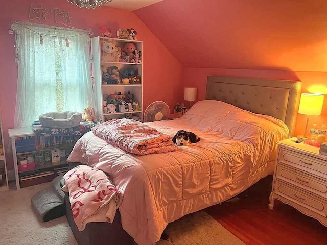 bedroom featuring vaulted ceiling