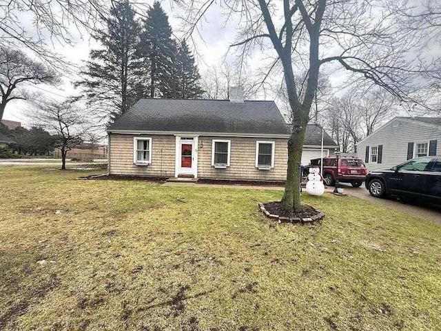 view of front of home featuring a front yard