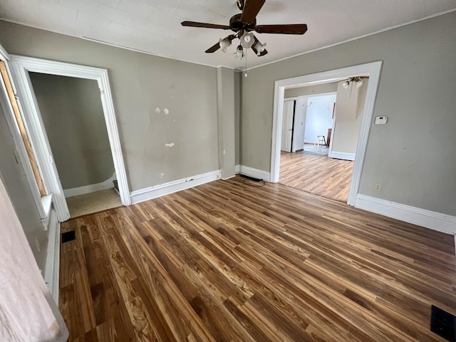 unfurnished room featuring wood-type flooring and ceiling fan