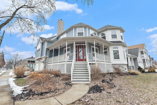 view of front of property featuring covered porch