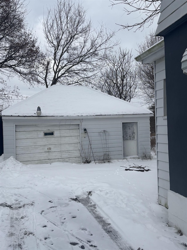 view of snow covered garage