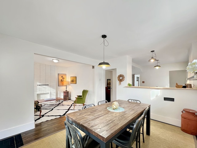 dining room with hardwood / wood-style floors